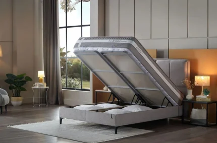 Ladă de lenjerie deschisă sub saltea