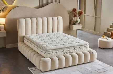 Vedere laterală a saltelei înalte Bio Natura cu suprafață matlasată pufoasă și margini finisate atent